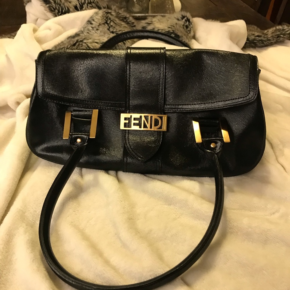 RARE RARE!!! FENDI GOLD TONE LOGO PURSE! Brand new!!!